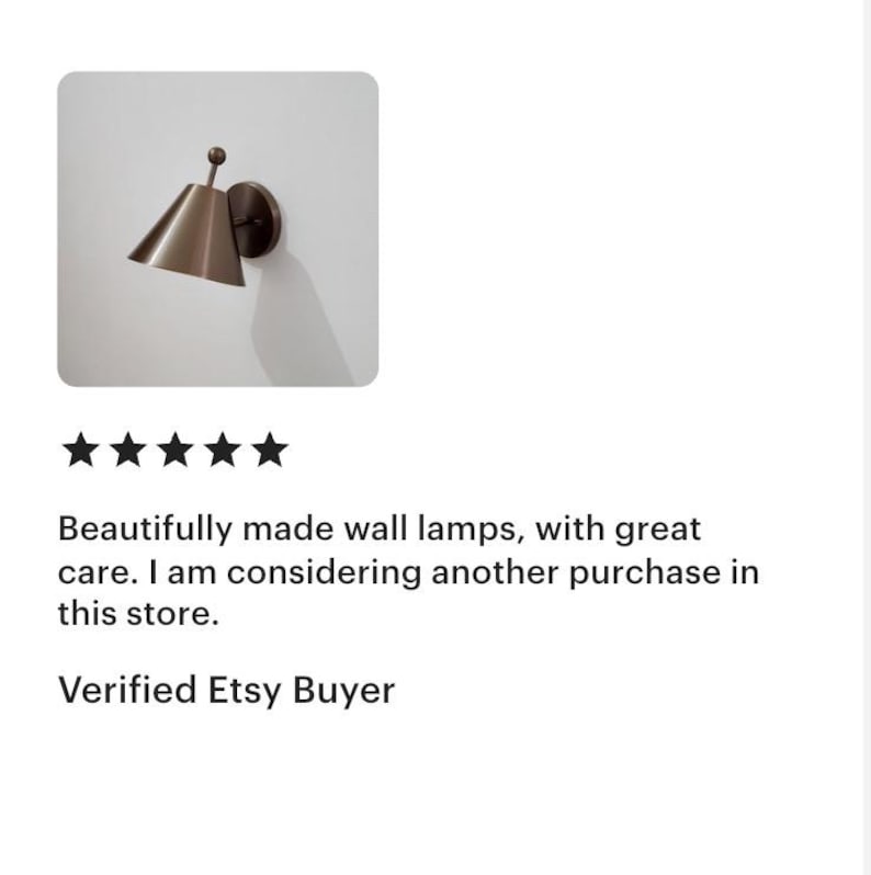 Two Handmade Solid Brass Sconces Are Shown Together from A Slightly Angled Perspective, Revealing Their Matching Finial Accents and Traditional Profiles. Each Fixture Has an 8 Inch Height and 7 Inch Width, Creating a Balanced Pair for Decorative Indoor Wall Lighting, Frost Lights.