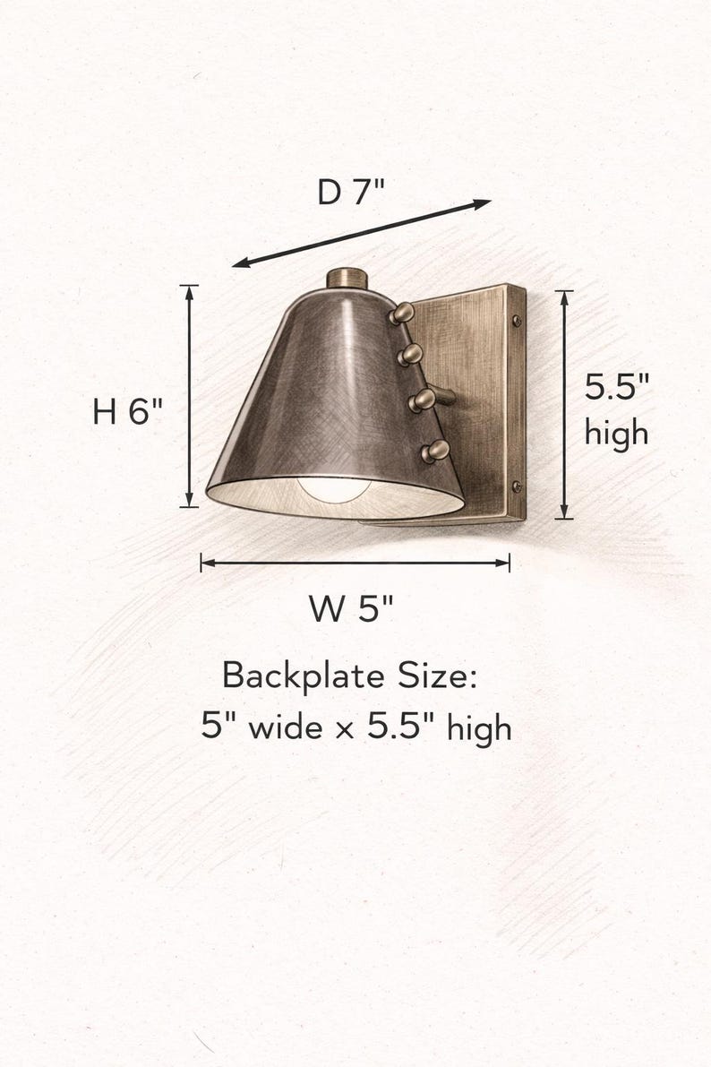 The Tapered Wine Shade Is the Focal Point of This Handcrafted Wall Sconce, Complemented by Solid Brass Detailing and Rivet Accents that Give the Compact Fixture a Refined Vintage Modern Character, Frost Lights.