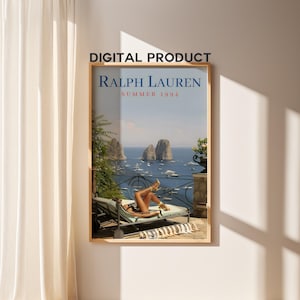 May include: A framed digital print featuring the Ralph Lauren Summer 1994 advertisement. The image depicts a person reclining on a lounge chair overlooking a seascape with boats. The print is in a wooden frame.