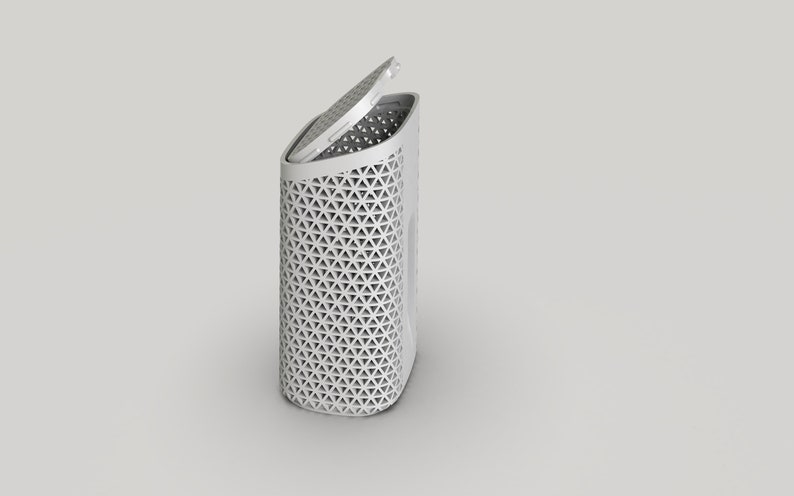 May include: White laundry hamper with a geometric pattern and a hinged lid. The lid is open.