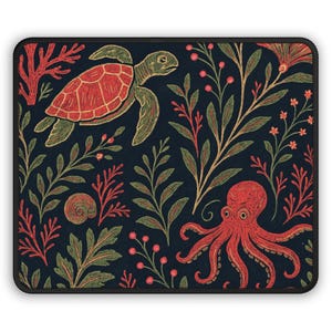 May include: A rectangular mousepad featuring a dark blue background with a repeating pattern of sea life. The design includes a red sea turtle, a red octopus, and various green and red plants. The mousepad has a black border.