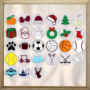 May include: A set of 24 round white stickers with various holiday and sports themed designs. The designs include a pumpkin, mittens, a Santa hat, a Christmas tree, a nativity scene, a gift box, Santa Claus, a snowman, a wreath, holly, a stocking, a paw print, a football, a soccer ball, a volleyball, a basketball, a baseball, a softball, a golf cart, ice skates, lacrosse sticks, hockey sticks, ice skates, a pool, a fishing rod, and a deer.