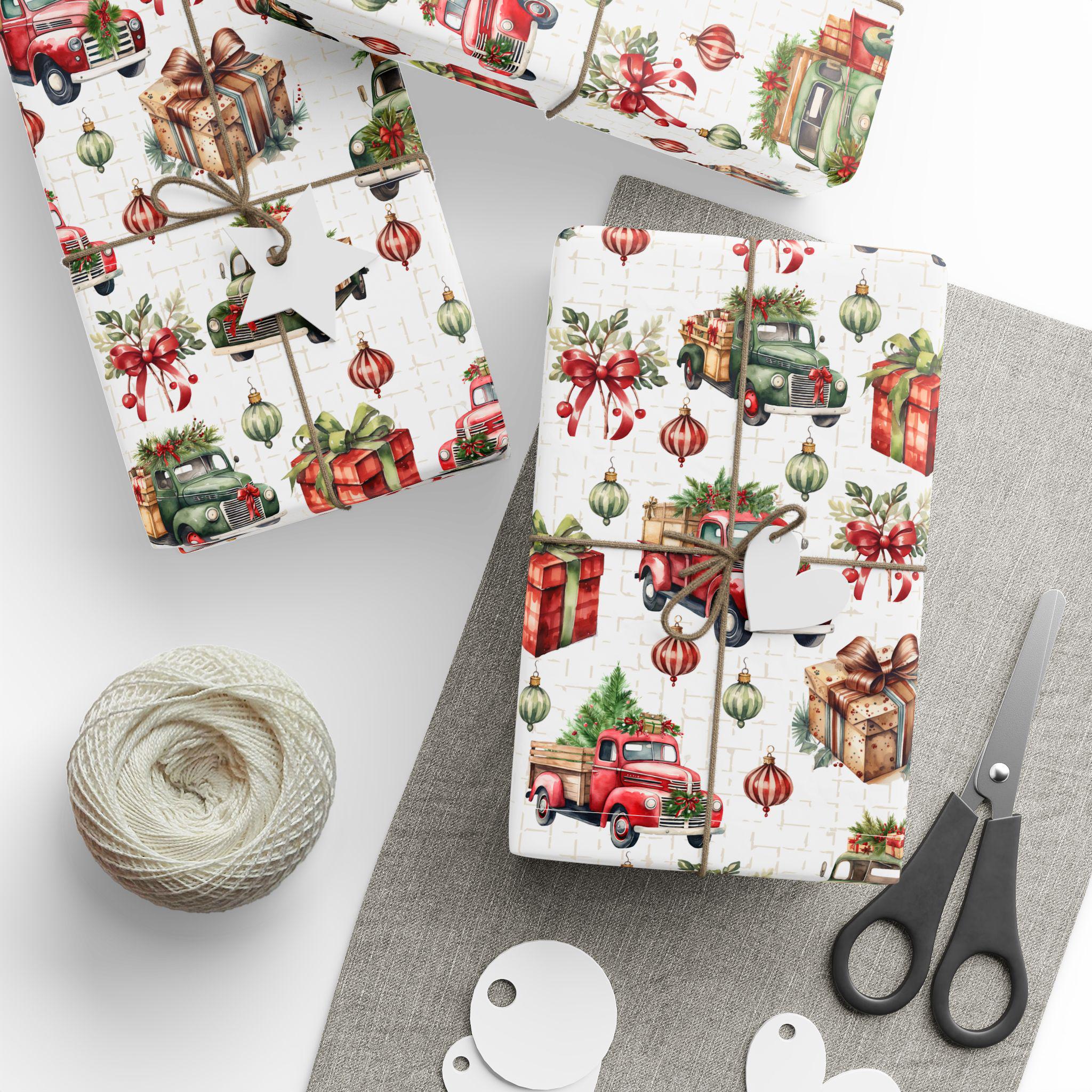May include: Wrapping paper featuring a repeating pattern of red and green vintage trucks carrying Christmas trees, red gift boxes, and hanging ornaments on a white background. The paper is tied with twine and includes white star-shaped gift tags.