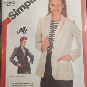 May include: Simplicity sewing pattern 5926 featuring a woman wearing a beige blazer over a striped shirt. The pattern includes sizes 10, 12, and 14. The image also shows a smaller illustration of a blazer. The price is $2.50.