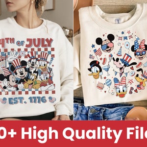 May include: Two white sweatshirts with a 4th of July theme featuring Mickey Mouse and friends. The first sweatshirt has a red, white, and blue checkered background with Mickey Mouse, Minnie Mouse, Donald Duck, Goofy, Pluto, and Daisy Duck. The text "4th of July" and "EST. 1776" are printed on the sweatshirt. The second sweatshirt has a circular design with Mickey Mouse, Minnie Mouse, Donald Duck, Goofy, Pluto, and Daisy Duck wearing red, white, and blue patriotic hats and accessories.