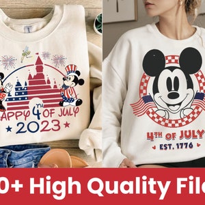 May include: Two white sweatshirts with red, white, and blue designs. The first sweatshirt features Mickey Mouse and Minnie Mouse in front of a castle with fireworks and the text "Happy 4th of July 2023". The second sweatshirt features Mickey Mouse holding two American flags with the text "4th of July Est. 1776".