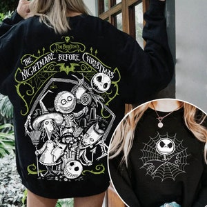 May include: Two black sweatshirts with a white graphic print of characters from the movie "The Nightmare Before Christmas". The first sweatshirt features the title of the movie and the characters Jack Skellington, Sally, Oogie Boogie, and Zero. The second sweatshirt features Jack Skellington in a spiderweb.