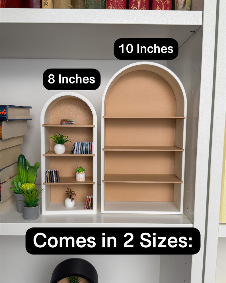 May include: Two white arched shelves with brown shelves. The smaller shelf is 8 inches wide and the larger shelf is 10 inches wide. The text "Comes in 2 Sizes." is below the shelves.