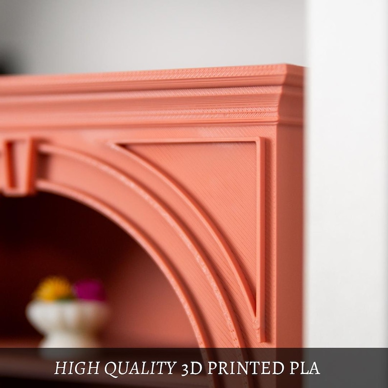 May include: Close-up of a coral-coloured, 3D-printed decorative shelf with an arched design. The shelf has a detailed, textured surface and the text "HIGH QUALITY 3D PRINTED PLA" is visible at the bottom.