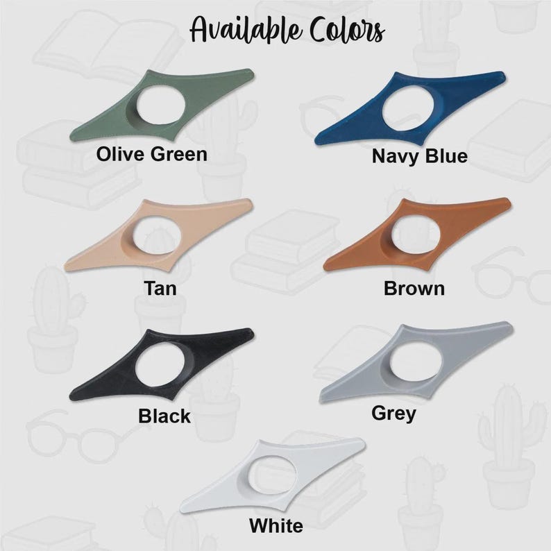 以下が含まれることがあります： オリーブグリーン、ネイビーブルー、タン、ブラウン、ブラック、グレー、ホワイトの様々な色のブックホルダーのセレクション。各アクセサリーは、円形の開口部を備えたユニークなデザインが特徴です。「Available Colors」の文字が上部にあります。