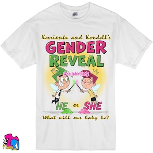 May include: White t-shirt with a colorful graphic for a gender reveal. The design features cartoon characters with wands, the text "GENDER REVEAL", and the question "What will our baby be?"