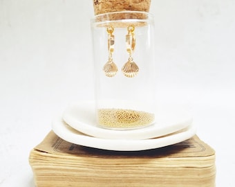 Gold Seashell Huggie Earrings in a bottle