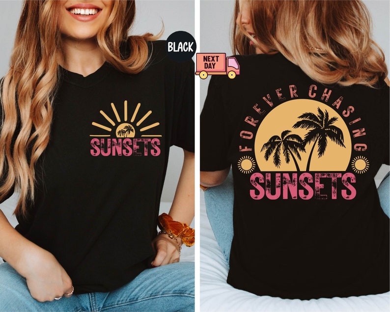 May include: Black t-shirt with a sunset graphic. The front features a sun and palm trees with the word "SUNSETS" in pink. The back of the shirt has a larger sunset design with the words "FOREVER CHASING SUNSETS".