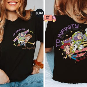 May include: Black t-shirt with a graphic print of Buzz Lightyear and Woody from Toy Story. The graphic features the text "To Infinity and Beyond".