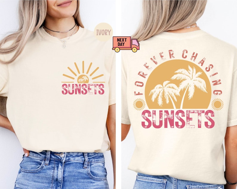 May include: Ivory-colored t-shirt with a sunset graphic on the front and back. The front features a sun with the word "SUNSETS" in pink. The back has a sunset with palm trees and the words "FOREVER CHASING SUNSETS".