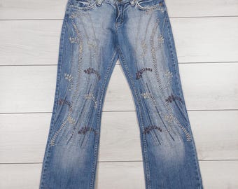 John Galliano vintage Blue jeans with embroidery and scuffs, size 27