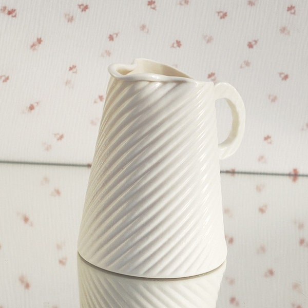 Porcelain creamer. I walk the line collection. Design by Wapa Studio.
