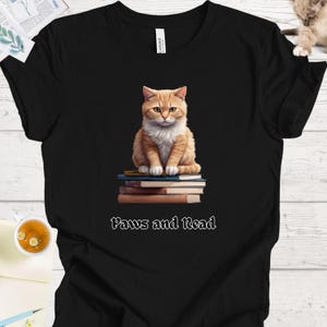 Cat Lover&#39;s Bookish Shirt - Cute Kitty Reading Book for Book and Cat Enthusiasts, Paws and Read