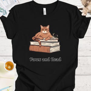 Cat Lover&#39;s Bookish Shirt - Cute Kitty Reading Book for Book and Cat Enthusiasts, Paws and Read