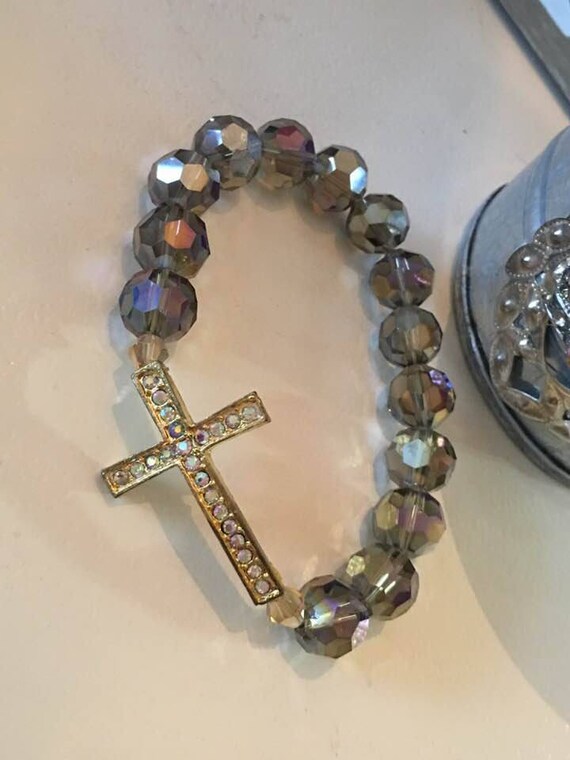 Items similar to crystal gold cross stretchy bracelet handmade