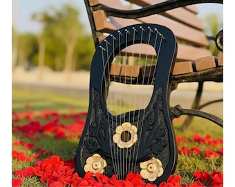 Lira de palisandro negro dorado, instrumento musical de estilo griego antiguo.