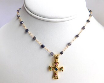 Cross gemstone pendant necklace .