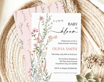 May include: A baby shower invitation with a floral design. The invitation is for Olivia Smith and says "Baby in Bloom". The invitation includes the date, time, location, and RSVP information.