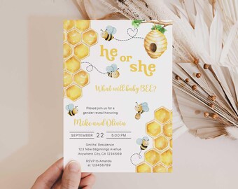 May include: A gender reveal invitation with a bee theme. The invitation features yellow honeycomb designs, cartoon bees, and the text "he or she, what will baby BEE?" The invitation also includes event details for Mike and Olivia.
