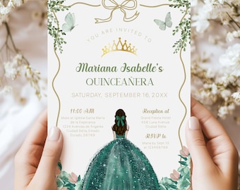 May include: A quinceañera invitation card held by hands. The invitation features a gold crown, a green dress illustration, and text that reads "Mariana Isabelle's Quinceañera". The card has a floral and butterfly design.