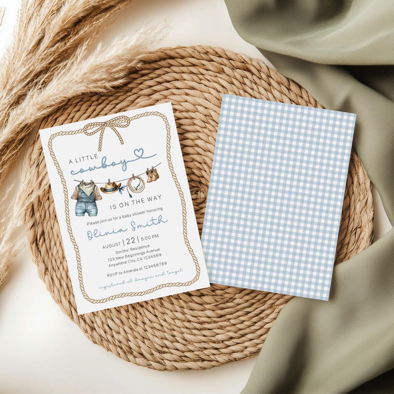 May include: Baby shower invitation with a cowboy theme. The invitation features a watercolor illustration of cowboy attire, including overalls and a hat, with the text "A Little Cowboy Is On The Way." The back of the invitation has a blue and white gingham pattern.