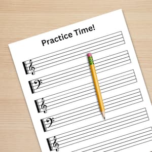 May include: A blank sheet of music paper with a treble clef and five lines. The paper has the words "Practice Time!" at the top. A yellow pencil with a pink eraser is lying on the paper.