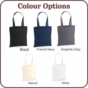 May include: An image displaying five tote bags in various colors: black, French navy, graphite grey, natural, and white. The text "Colour Options" is at the top. Each bag has a rectangular body and two handles.