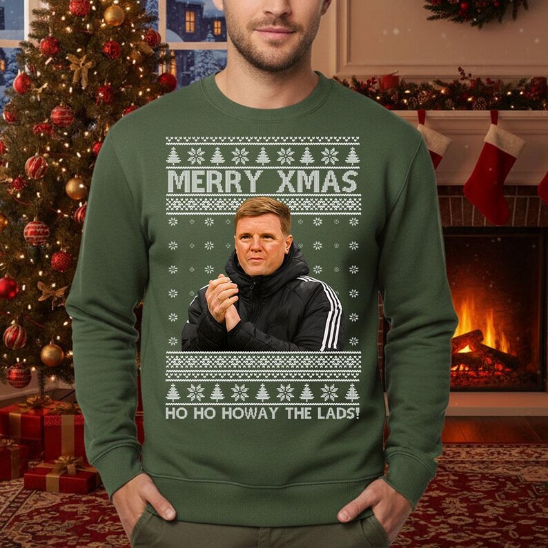 May include: Green Christmas sweater with the text "MERRY XMAS" and "HO HO HOWAY THE LADS!". The sweater features a portrait of a man and snowflake and Christmas tree patterns.