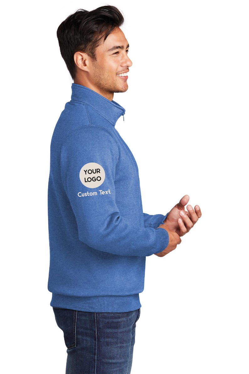 a man in a blue jacket is smiling