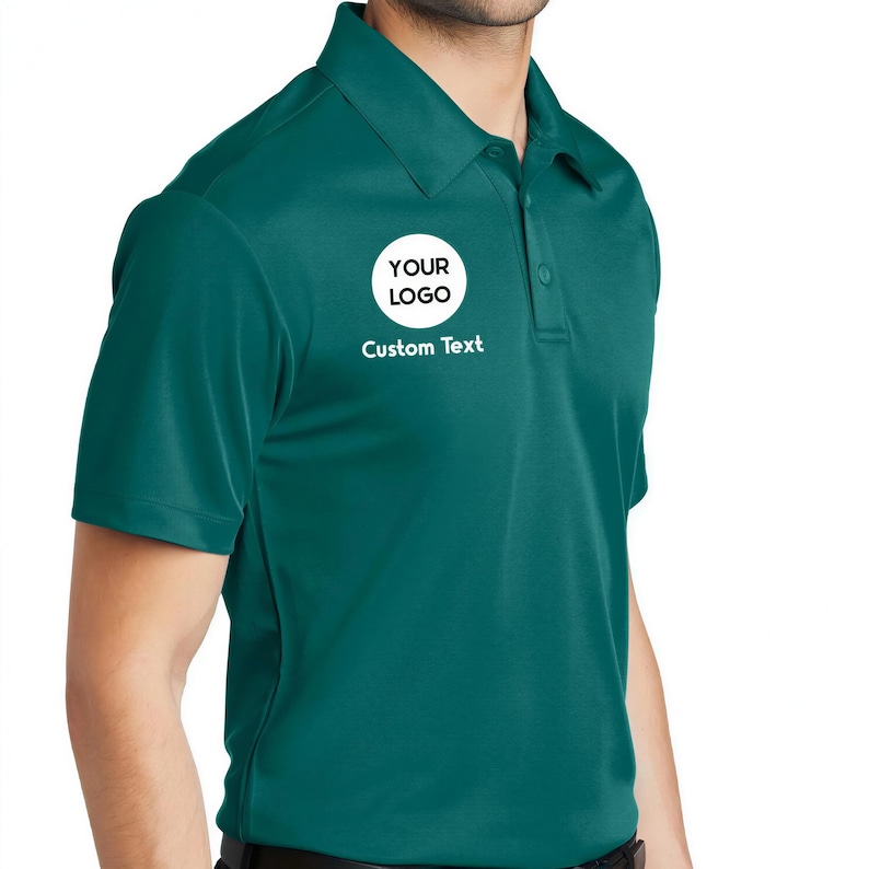 a man wearing a green polo shirt and black pants