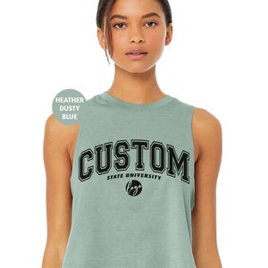 a woman wearing a crop top with the word custom on it