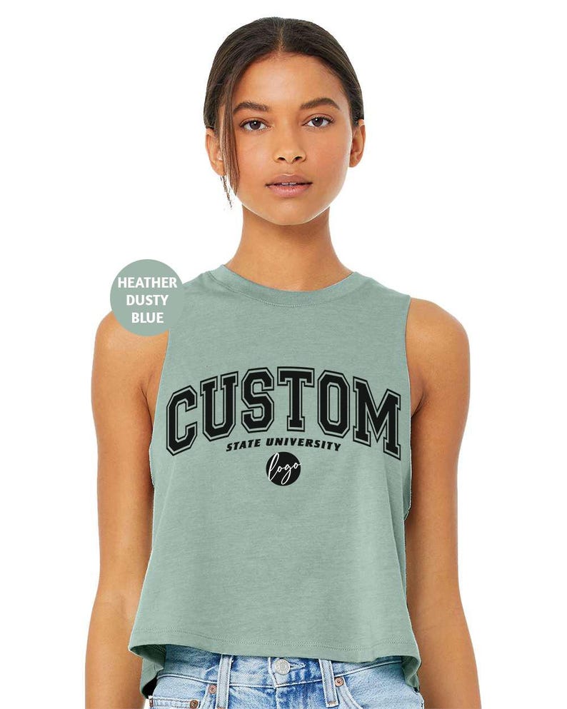 a woman wearing a crop top with the word custom on it