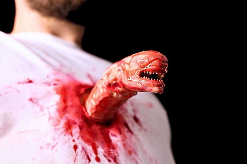 Chest exploding creature! Scary halloween costume or Alien cosplay! Face grabbing baby breaks open chest. Holder works with most belts Painted