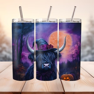 May include: Three stainless steel insulated tumblers with a Halloween-themed design. The design features a black Highland cow wearing a witch hat, set against a purple sky with a full moon and a carved pumpkin. Each tumbler has a silver straw.