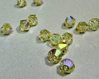 Swarovski - Jonquil AB - 5328 - 4mm Bicone Beads