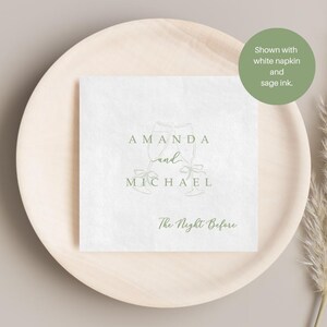 Personalized rehearsal dinner napkin in sage ink, champagne flutes with bow accent, white napkin