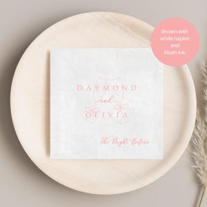 Personalized rehearsal dinner napkin in blush ink, champagne flutes with bow accent, white napkin