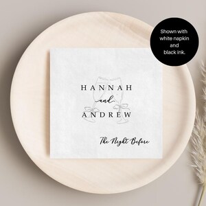 Personalized rehearsal dinner napkin in black ink, champagne flutes with bow accent, white napkin