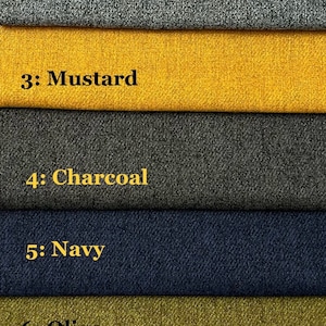 May include: A fabric swatch card featuring seven different textured fabric samples. Colors include Latte, Pewter, Mustard, Charcoal, Navy, Olive, and Mink. Each swatch is labeled with its respective color name.