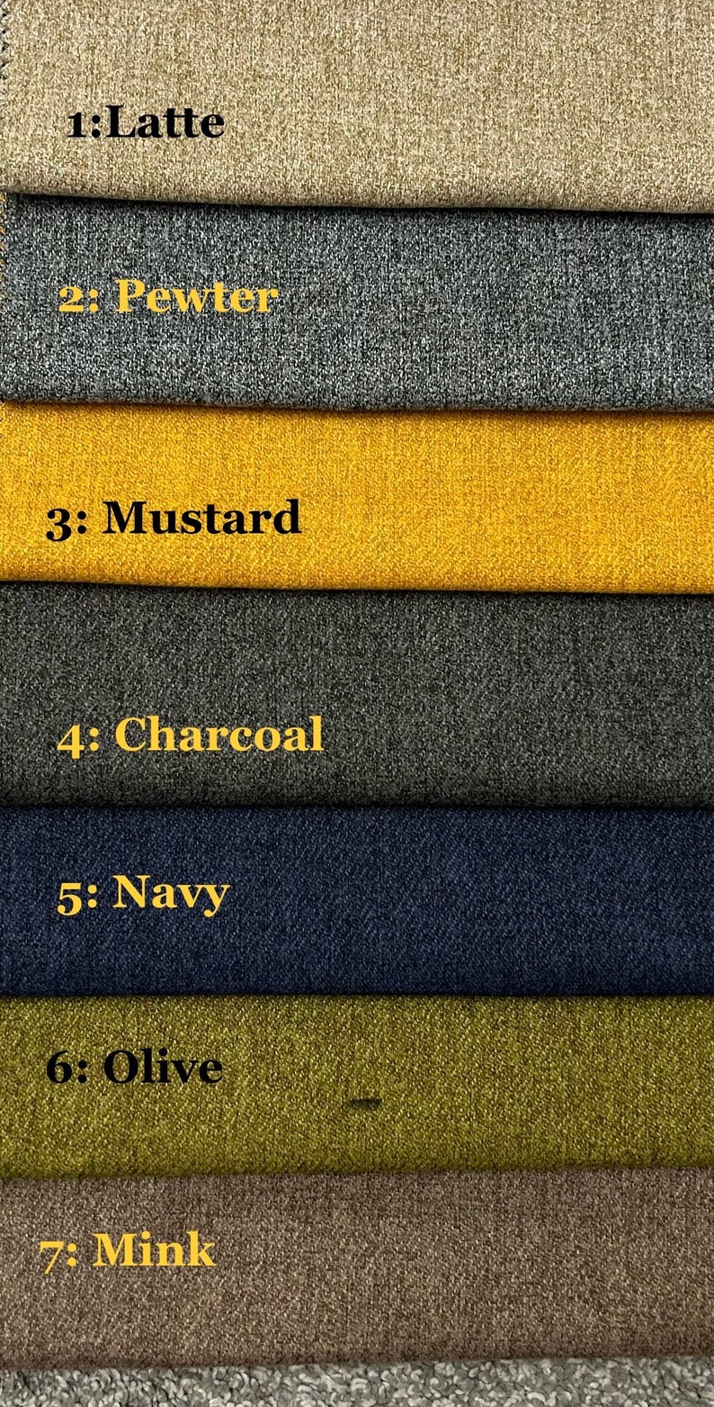 May include: A fabric swatch card featuring seven different textured fabric samples. Colors include Latte, Pewter, Mustard, Charcoal, Navy, Olive, and Mink. Each swatch is labeled with its respective color name.