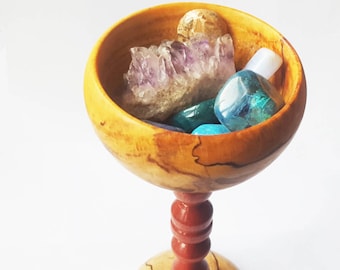 Goblet style candy dish turned from pink ivory and spalted hazelnut wood.