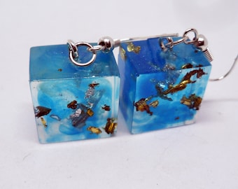 blue swirl and gold fleck cube earrings