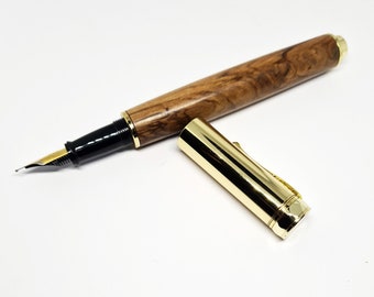 Fountain pen turned from olive wood from Bethlehem with copper inlay