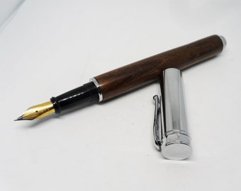 fountain pen turned from walnut - silver trim