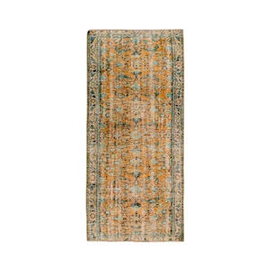 May include: A set of three ceramic mugs with a speckled, matte finish. The mugs are in shades of cream, light gray, and dark gray. Each mug has a simple, minimalist design, perfect for coffee or tea.